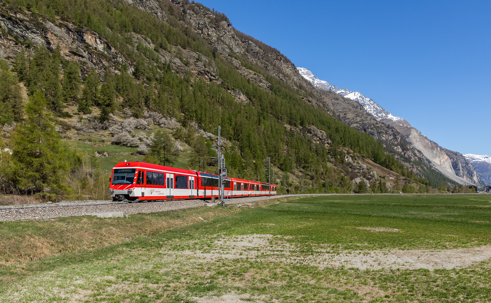 BDeh 4/8 "Zermatt-Shuttle" 2054 of MGB (Matterhorn Gotthard Bahn) between Täsch and Zermatt, Switzerland