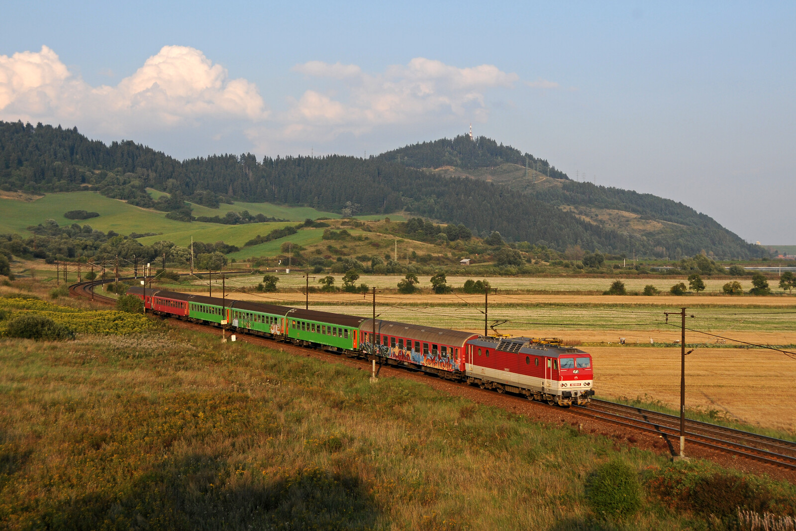163 001 of ZSSK (Železničná spoločnosť Slovensko) between Liptovské Vlachy and Liptovská Teplá, Slovakia