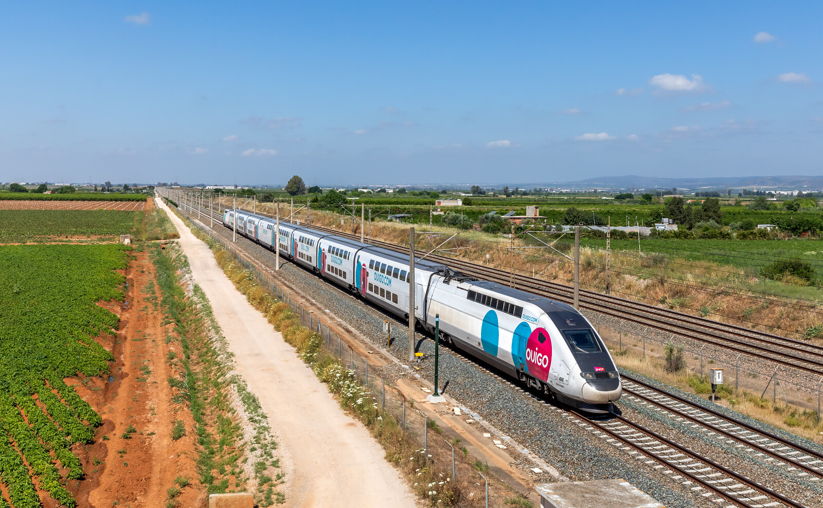 TGV Euroduplex (2N2) 820 of SNCF (Société Nationale des Chemins de fer Français) between Cantillana and Los Rosales, Spain