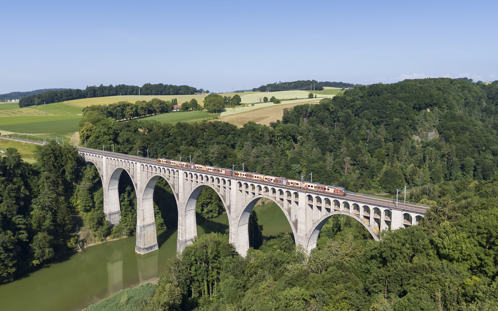 RBDe 560 235 of TPF (Transports Publics Fribourgeois) between Fribourg Poya and Düdingen, Switzerland