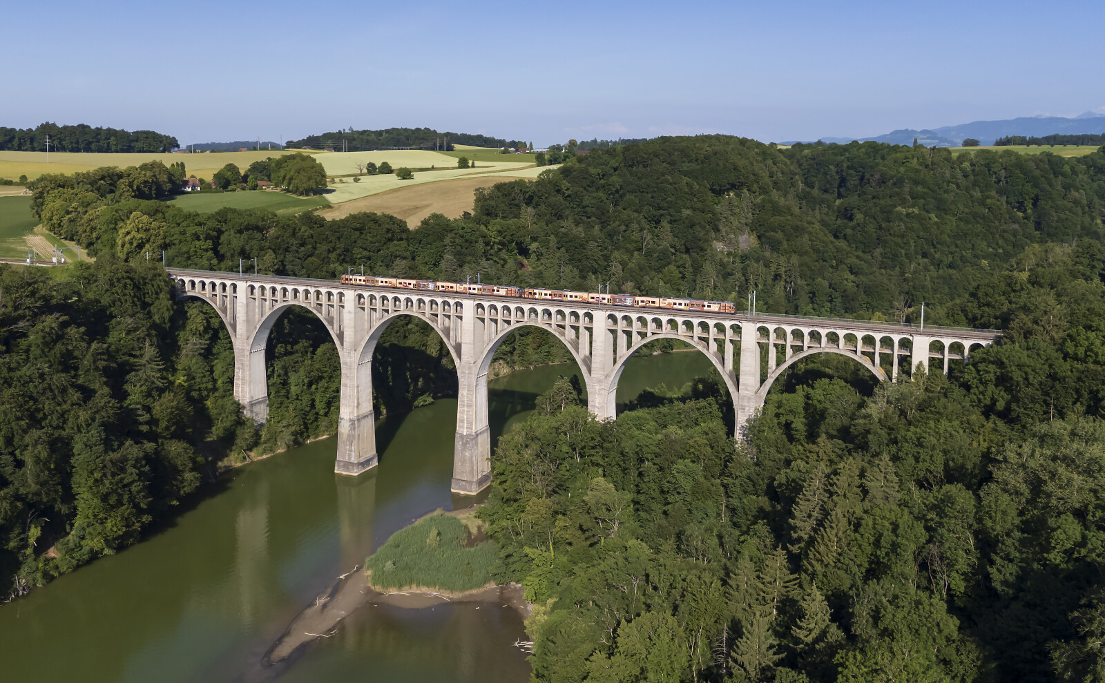 RBDe 560 235 of TPF (Transports Publics Fribourgeois) between Düdingen and Fribourg Poya, Switzerland