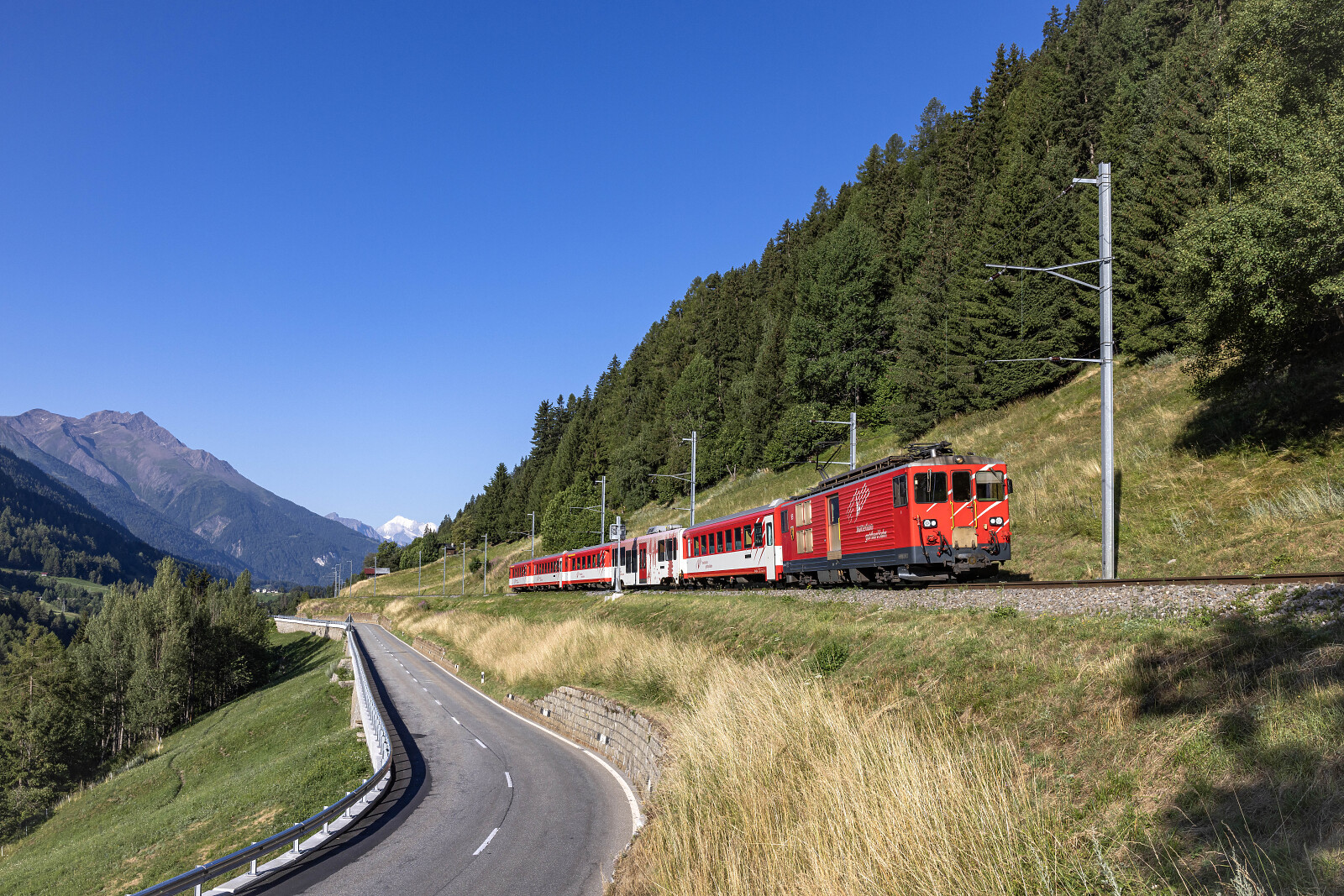 Deh 4/4 II 95 of MGB (Matterhorn Gotthard Bahn) between Fürgangen-Bellwald Talstation and Niederwald, Switzerland