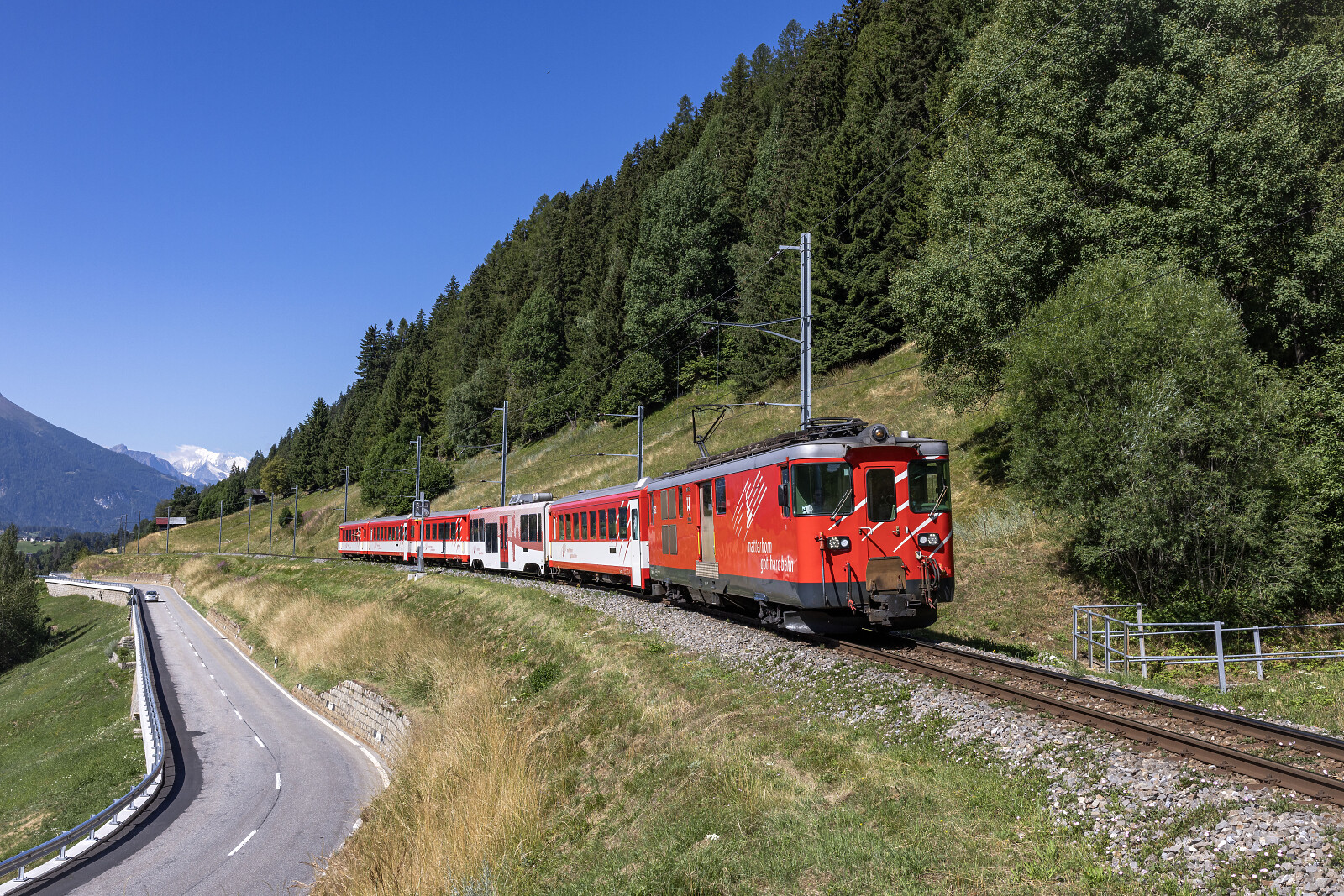 Deh 4/4 I 52 of MGB (Matterhorn Gotthard Bahn) between Fürgangen-Bellwald Talstation and Niederwald, Switzerland